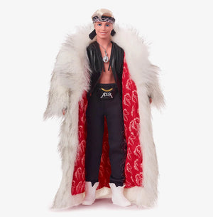 Ken Doll In Faux Fur Coat And Black Fringe Vest – Barbie The Movie Standing